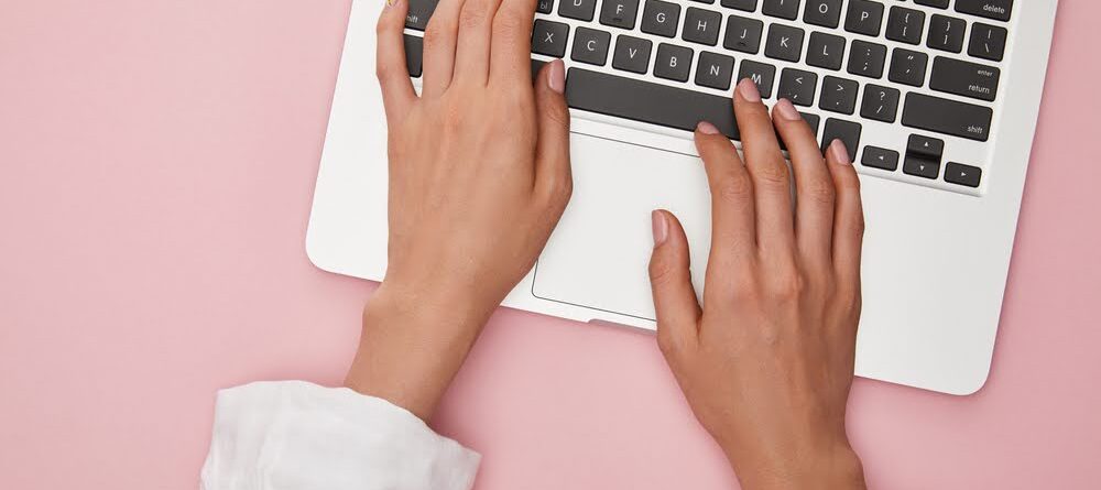 Woman using laptop for work