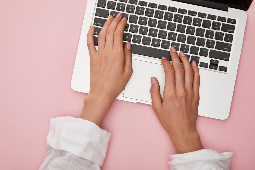 Woman using laptop for work