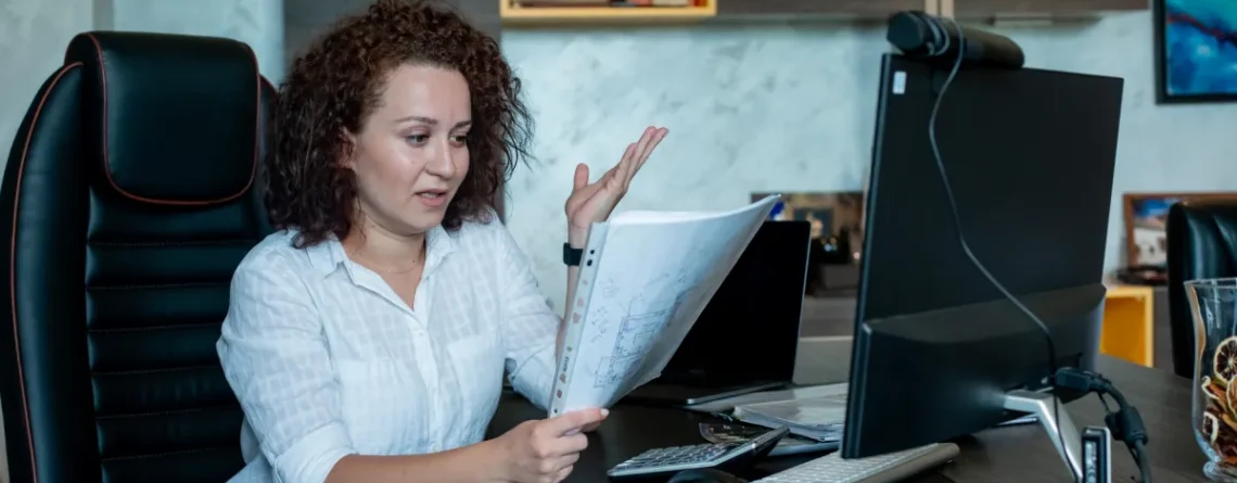 Professional reviews graphs and tables on a screen, illustrating the best online fax services with clear plan options.